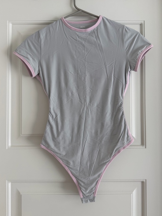 SKIMS Tops - Skims Bodysuit with Pink Trim